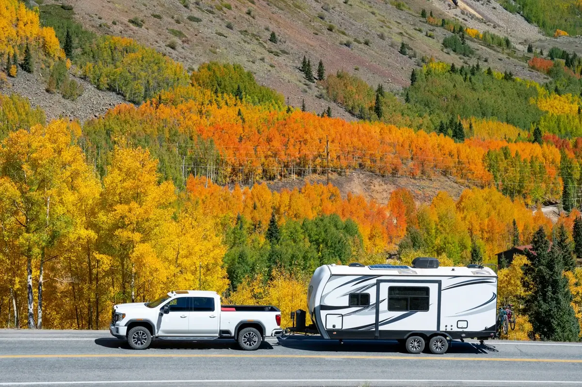 Truck Travel Trailer Driving Down Highway